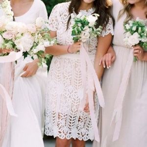 White lace dress with nude underlay